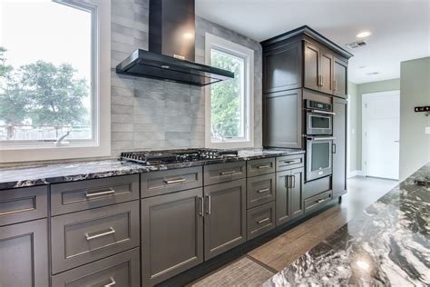 grey kitchen cabinets with stainless steel appliances|kitchen with gray cabinets.